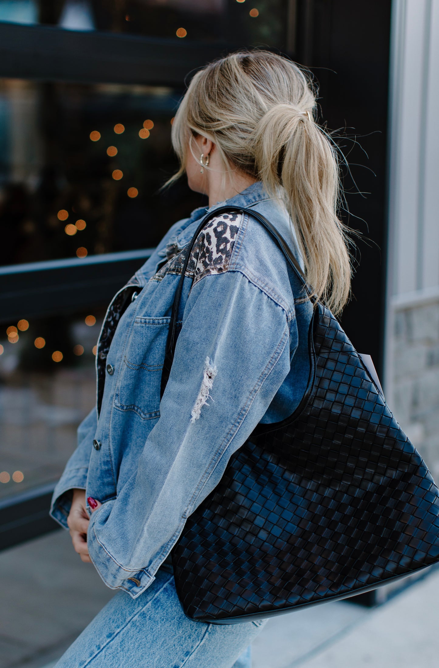 Black woven handbag