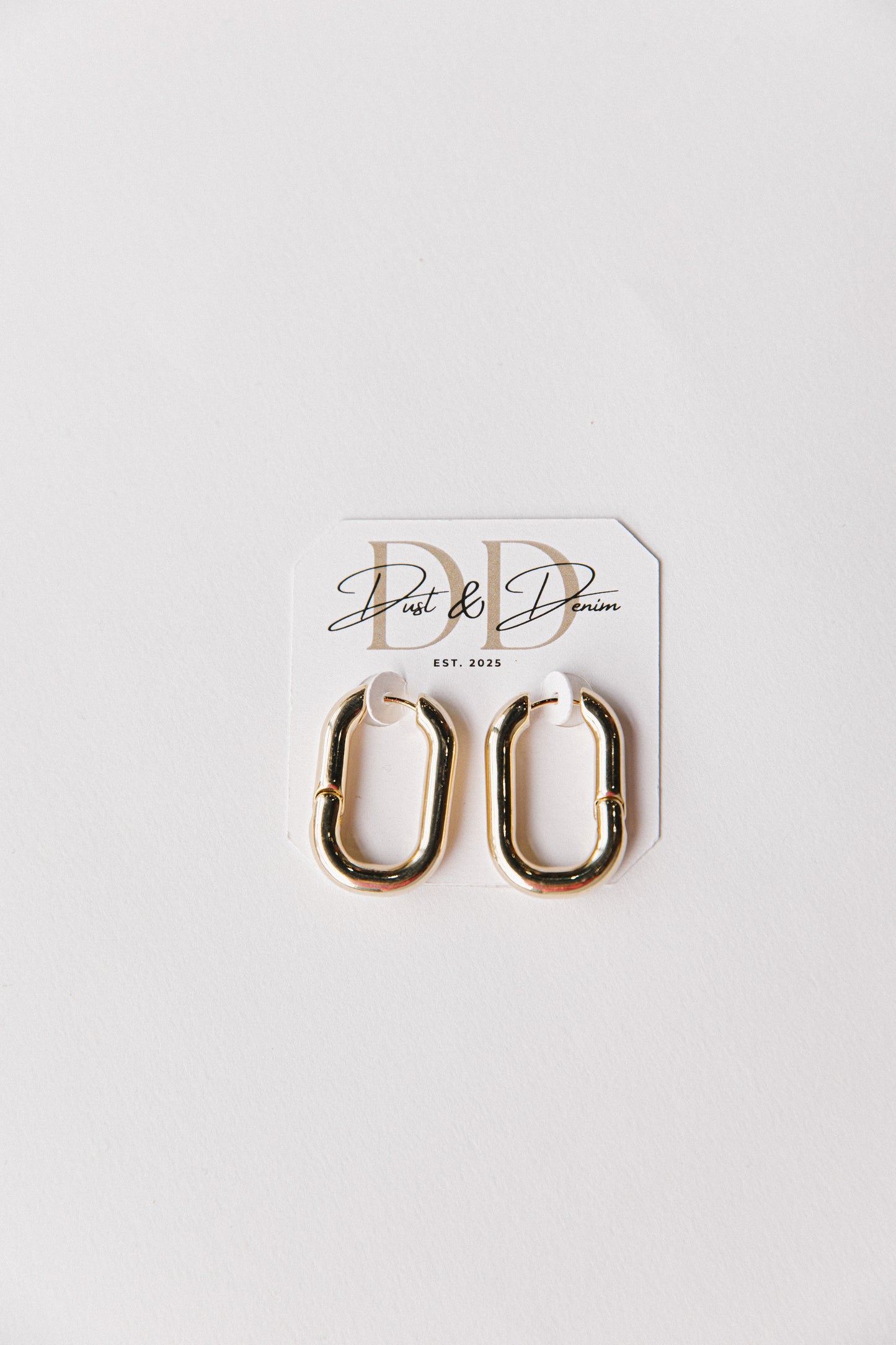 Gold oval hinged hoops