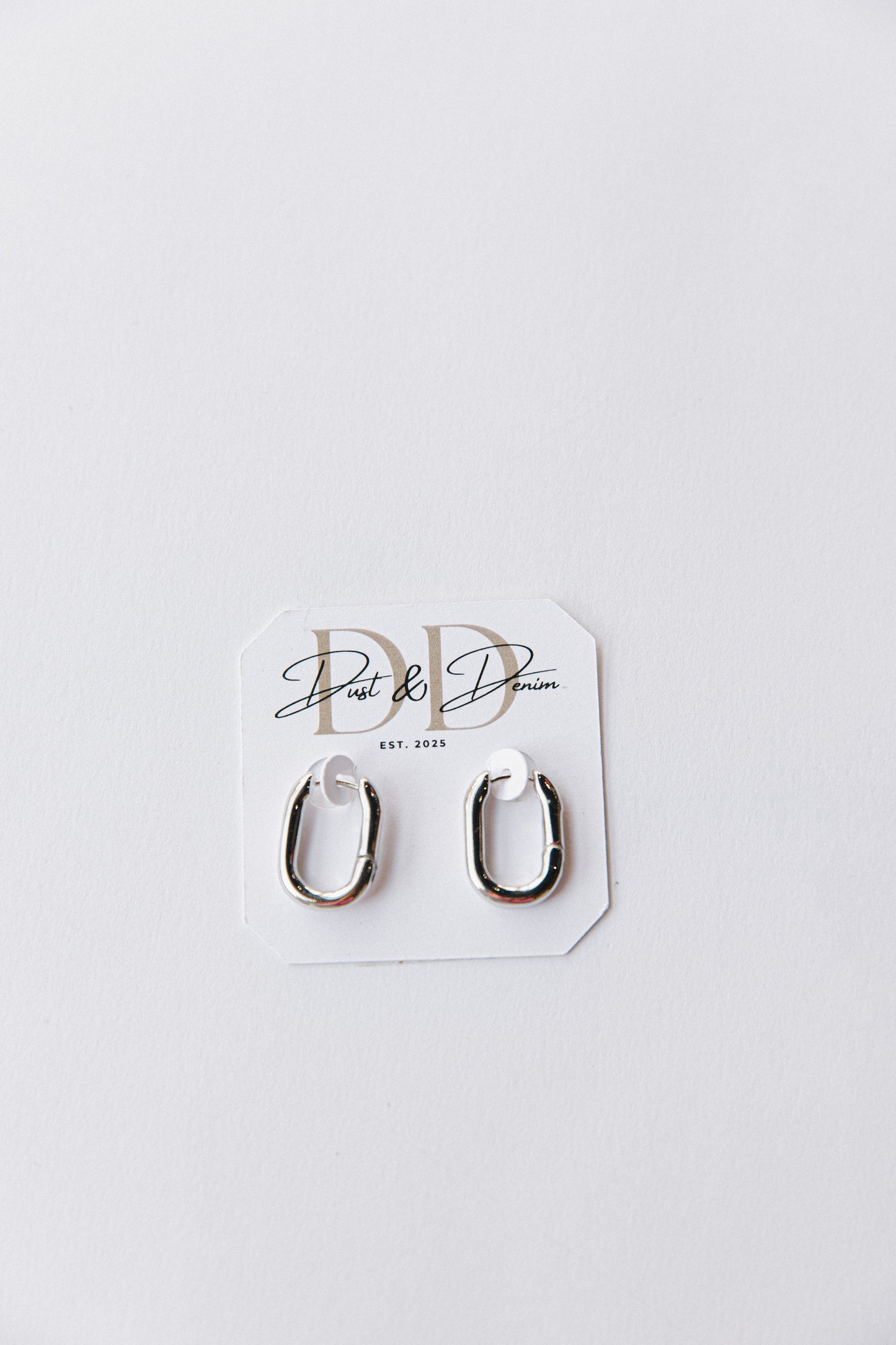 Gold oval hinged hoops